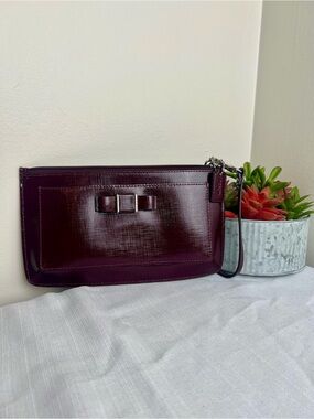 Coach Patent Leather Wristlet Clutch in Plum
